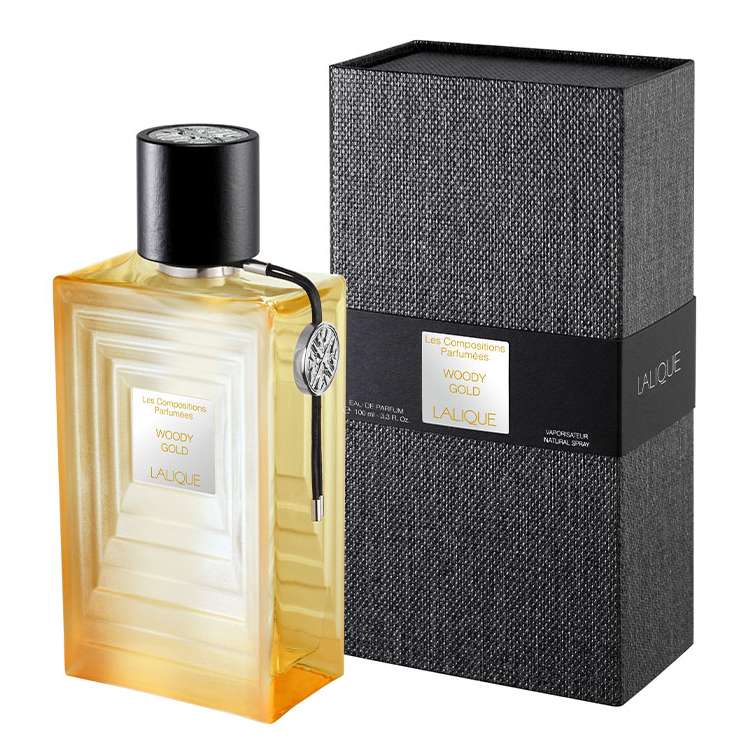 Les Compositions Parfumees Woody Gold by Lalique 100ml EDP - Perfume NZ is the leading wholesale distributor of brand name perfumes and fragrances in New Zealand.